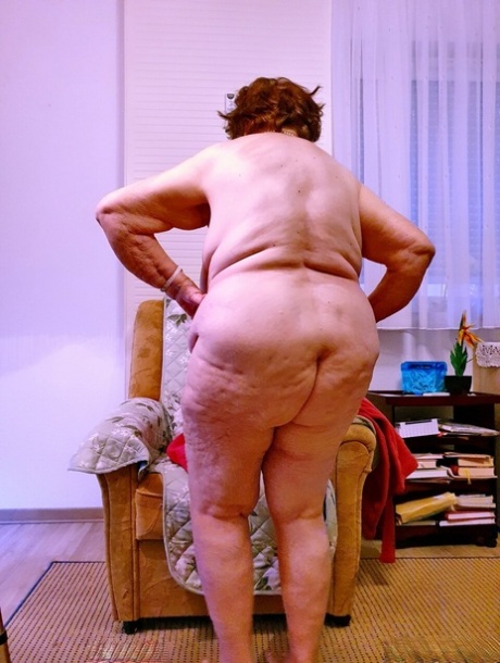 Fat old granny in sunglasses Petljura shows off her body and big tits