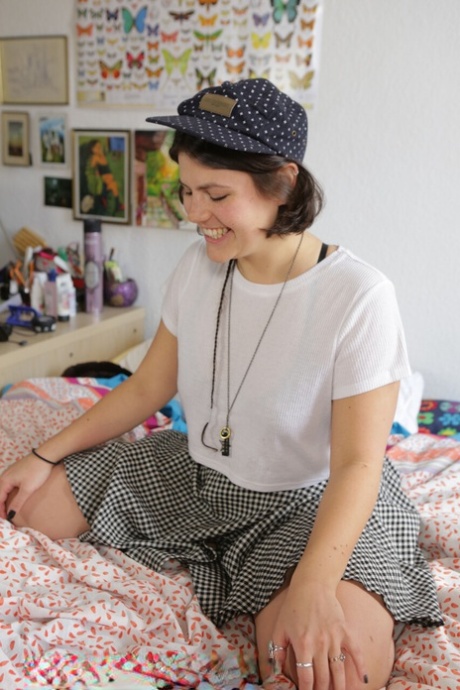 Chubby British girl Beatrix poses naked on a bed and fully clothed in Berlin