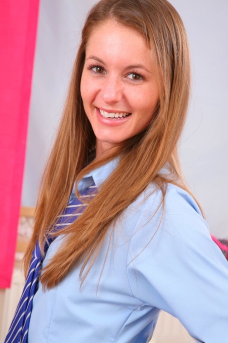 Cute teen Sadie exposes her natural titties and poses in pantyhose